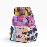 Baggu travel storage set with three zip pouches, colorful animal-print fabric