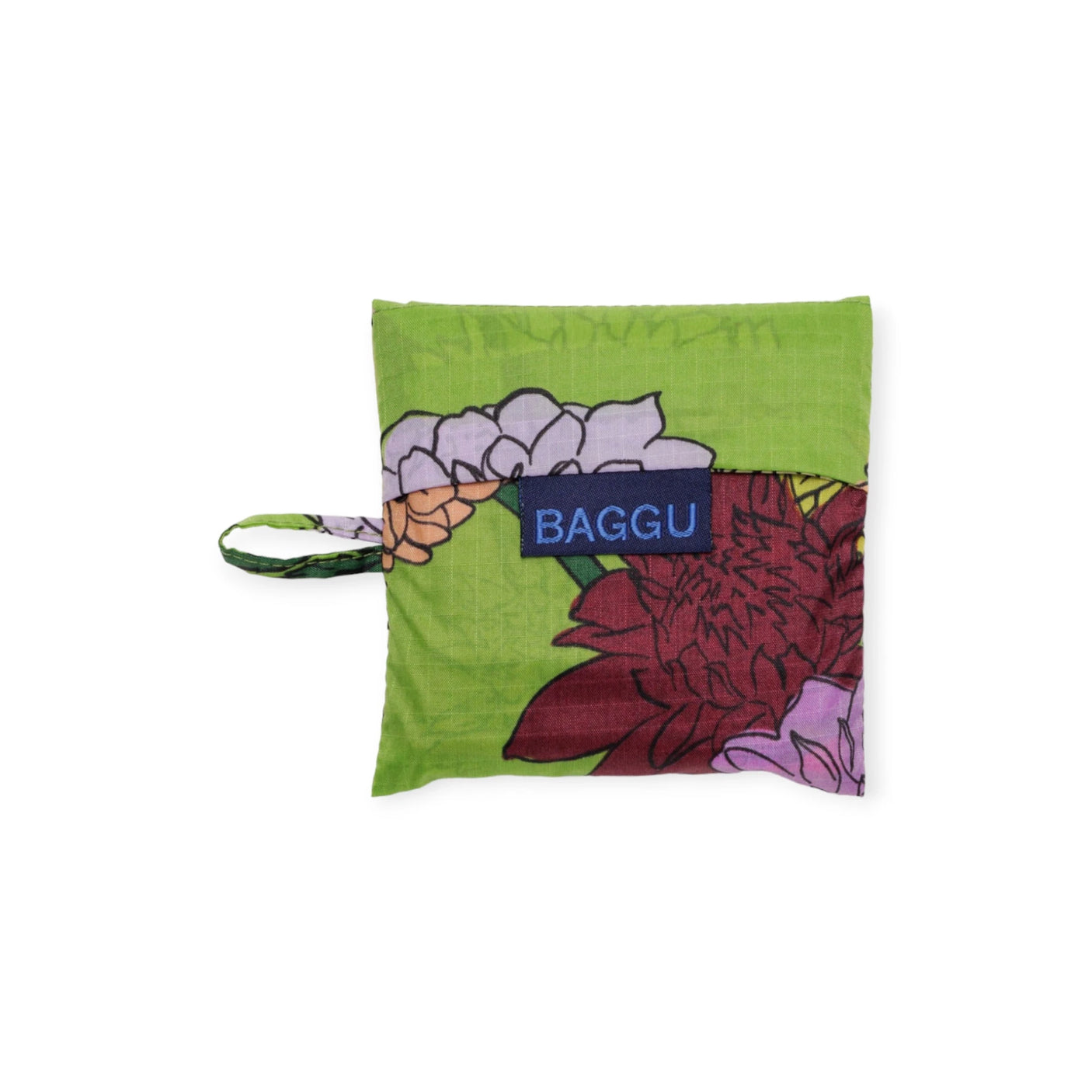 The Baby Baggu Reusable Bag in Dahlia print, featuring a delightful green and floral pattern, is neatly folded with the iconic "Baggu" label prominently displayed.