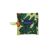 The Baby Baggu Reusable Bag - Orange Tree by Baggu is a small, square pouch made from recycled nylon, featuring a green and orange floral design with a blue "BAGGU" label and a convenient side loop. This bag brings sustainability and style to your everyday essentials.