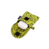 Baggu puffy earbuds case in chartreuse paisley with earbuds tucked inside