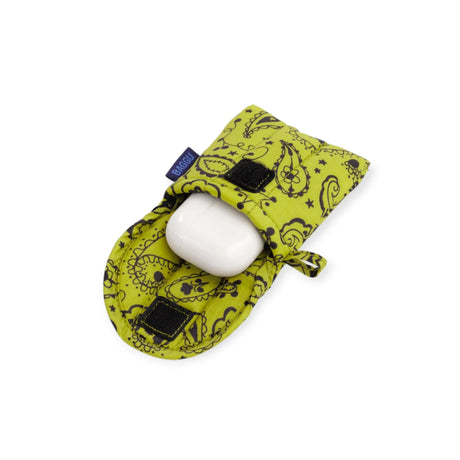 Baggu puffy earbuds case in chartreuse paisley with earbuds tucked inside