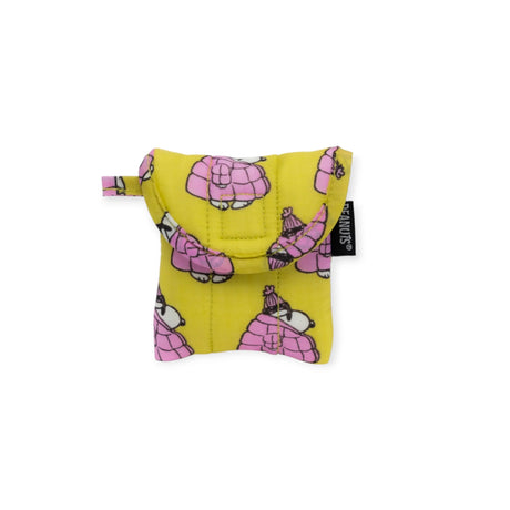 From the Peanuts x Baggu Collection, the Peanuts x Baggu Earbuds Case - Snoopy Puffer by Baggu features a delightful pattern of pink-armored armadillos on a small yellow pouch with a flap. Perfect for organizing your essentials, such as an earbuds case, it offers both charm and practicality.