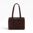 Brown canvas tote bag with flat top handles and center front panel
