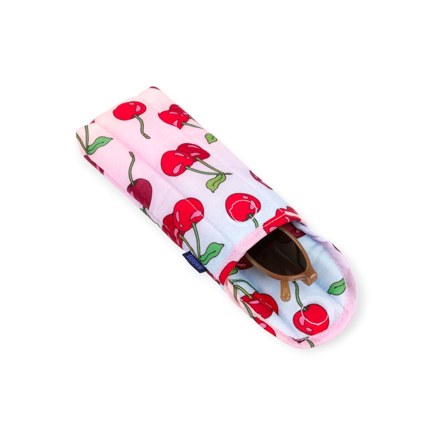 Soft fabric eyeglass pouch with red cherry print and pink trim partially holding brown sunglasses