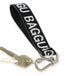 A black and white Baggu Logo Keychain made from recycled nylon webbing is attached to a set of keys with a silver metal clip carabiner.