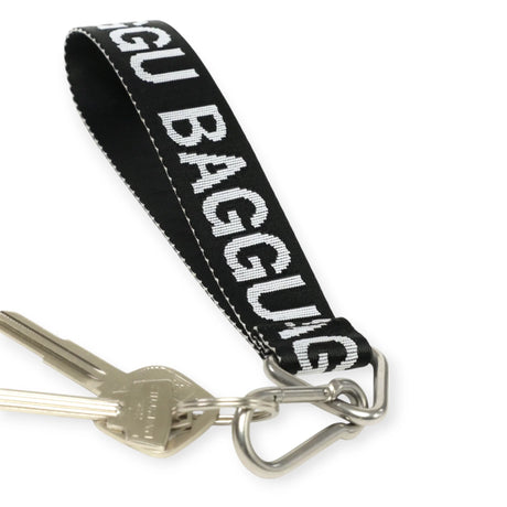 A Baggu Logo Keychain - Peony wrist strap crafted from recycled nylon webbing, featuring a silver metal clasp with keys attached.