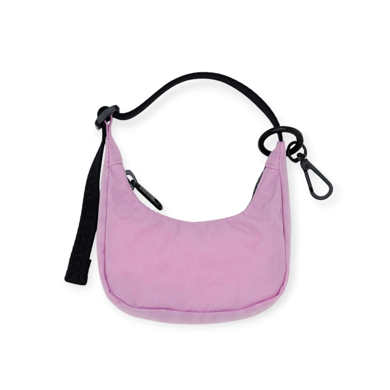 A crescent-shaped shoulder bag by Baggu, made from recycled nylon in a pink shade with a black strap and clasp attachment.