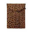 The Baggu Puffy Laptop Sleeve 13"/14" in leopard print features brown and black padding, a curved flap closure, and provides stylish protection for your laptop.