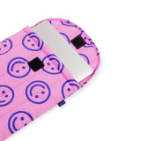 Baggu puffy laptop case, pink with blue pattern, open with gray lining and black straps