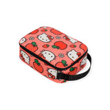 The Hello Kitty x Baggu Lunch Bag is a rectangular pink lunchbox adorned with cartoon cat faces, strawberries, and apples. Made by Baggu from recycled polyester and featuring a BPA-free lining, this lunch bag includes a convenient black side handle for easy carrying.