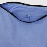 An open Baggu Medium Nylon Crescent Bag in cornflower blue, crafted from recycled materials, features a visible zipper pull against a white background.