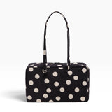Medium nylon bowler bag in black with cream polka dots, top zipper and handles