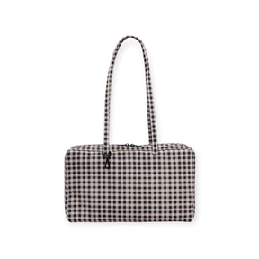 The Baggu Medium Nylon Bowler Bag – Gingham features a rectangular shape, black-and-white check gingham pattern, two handles, and a zipper closure, shown against a white background. Brand: Baggu.