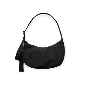 Medium crescent nylon hobo bag in black, with studded strap accents