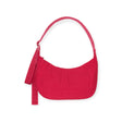 The Baggu Medium Nylon Crescent Bag in Candy Apple features a stylish curved shape and matching strap, capturing eco-friendly elegance.