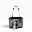 Reversible medium nylon tote with black-and-white check pattern and matching pouch