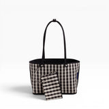 Reversible medium nylon tote with black-and-white check pattern and matching pouch