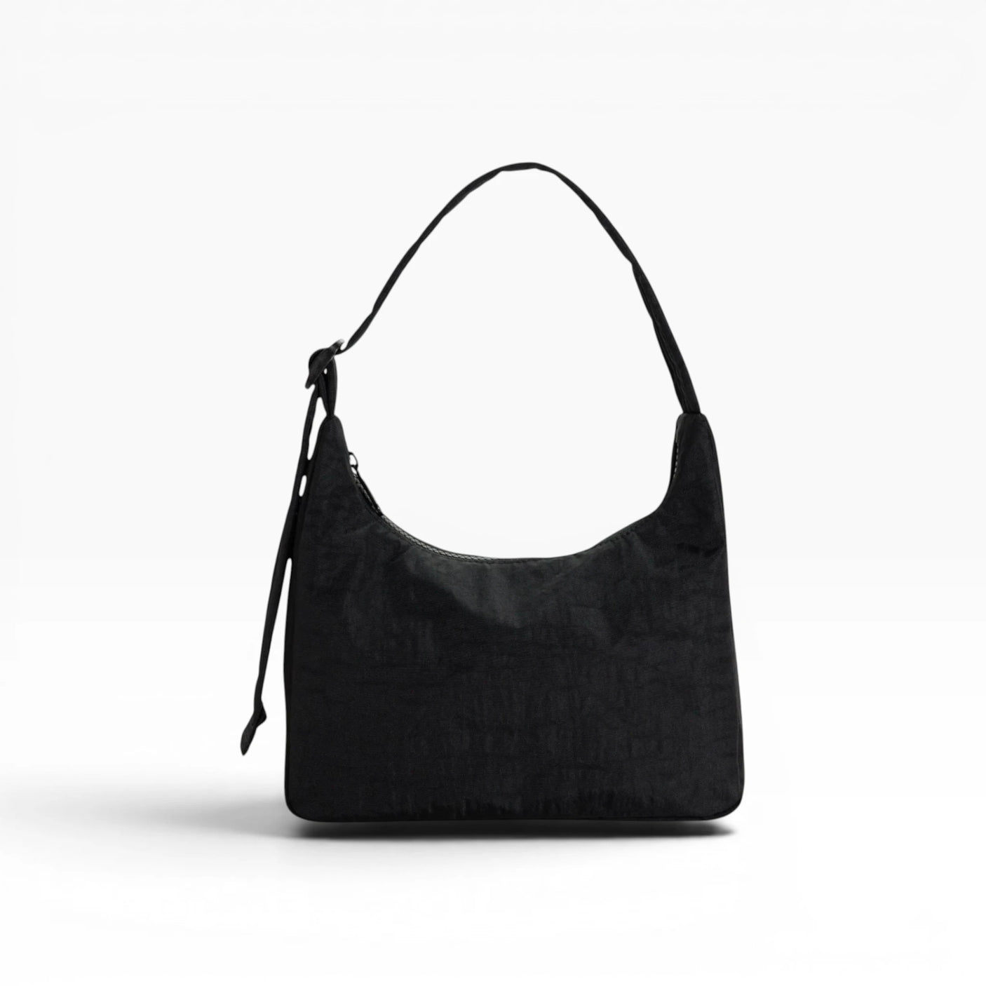 Baggu mini nylon shoulder bag, black, curved hobo shape with short shoulder strap