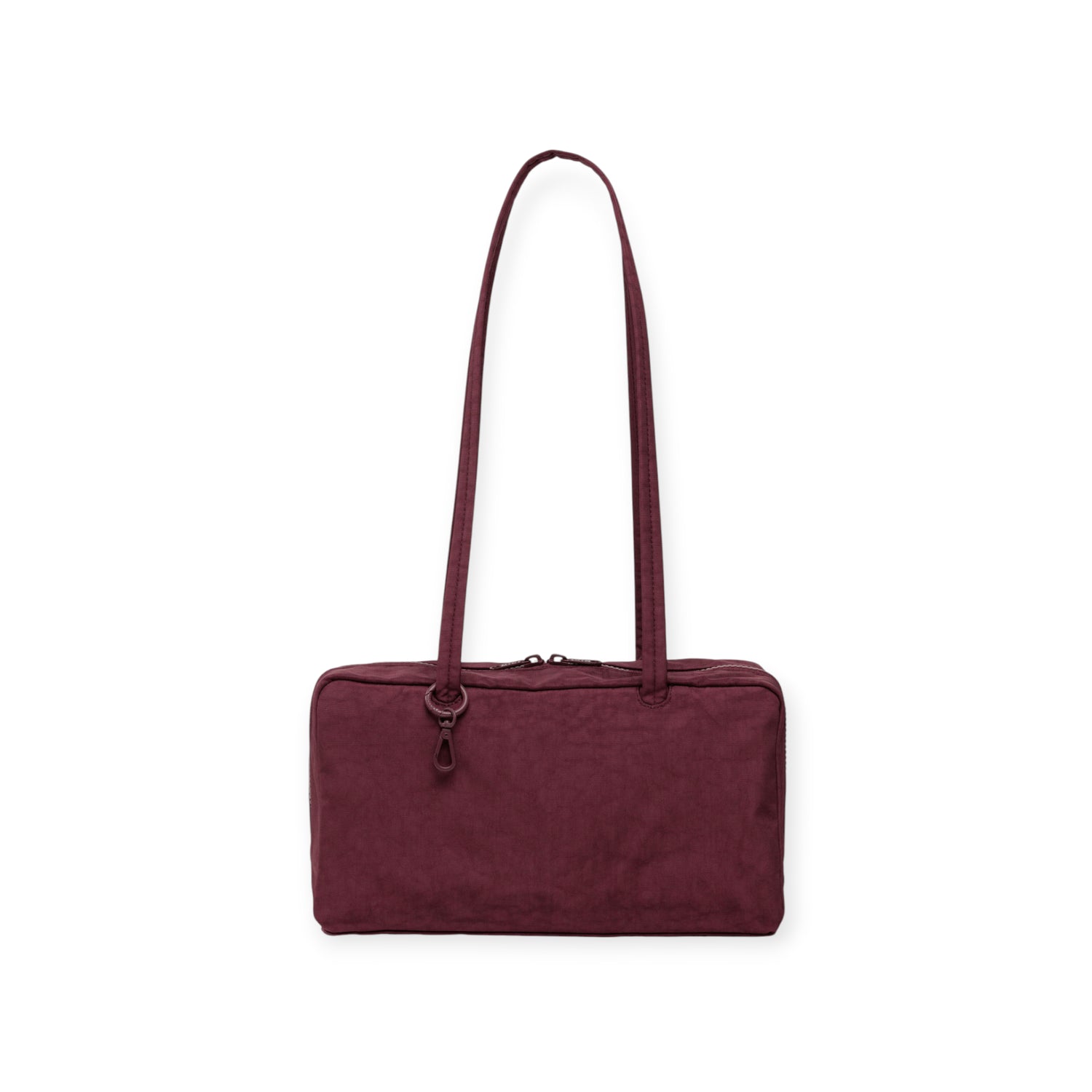 The Baggu Nylon Bowler Bag in mahogany features a rectangular shape, a long shoulder strap, and a zippered closure, showcased against a white background.