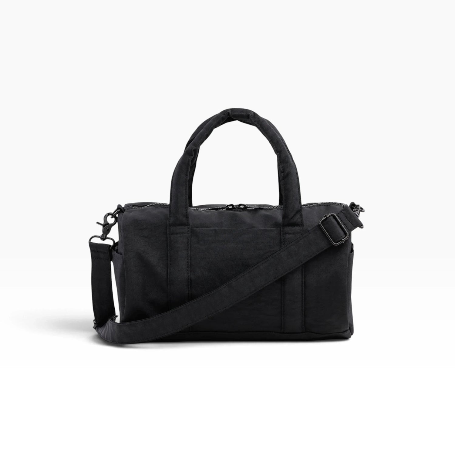 Black nylon duffle bag with top handles, shoulder strap, and zip closure