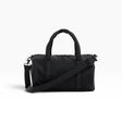 Black nylon duffle bag with top handles, shoulder strap, and zip closure