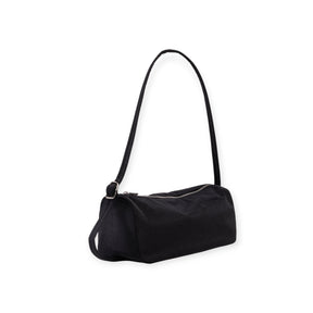 Small black rectangular shoulder bag with zipper closure and adjustable strap on white background