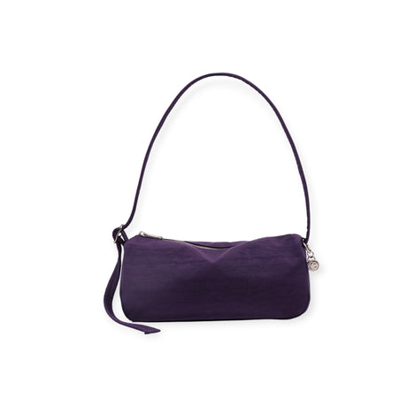 Rectangular deep purple fabric shoulder bag with top zipper and detachable thin strap on white background