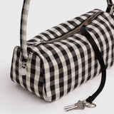 Gingham nylon bag with zip top, side strap, and key charm detail