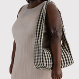 Black-and-cream gingham nylon hobo bag with long shoulder strap