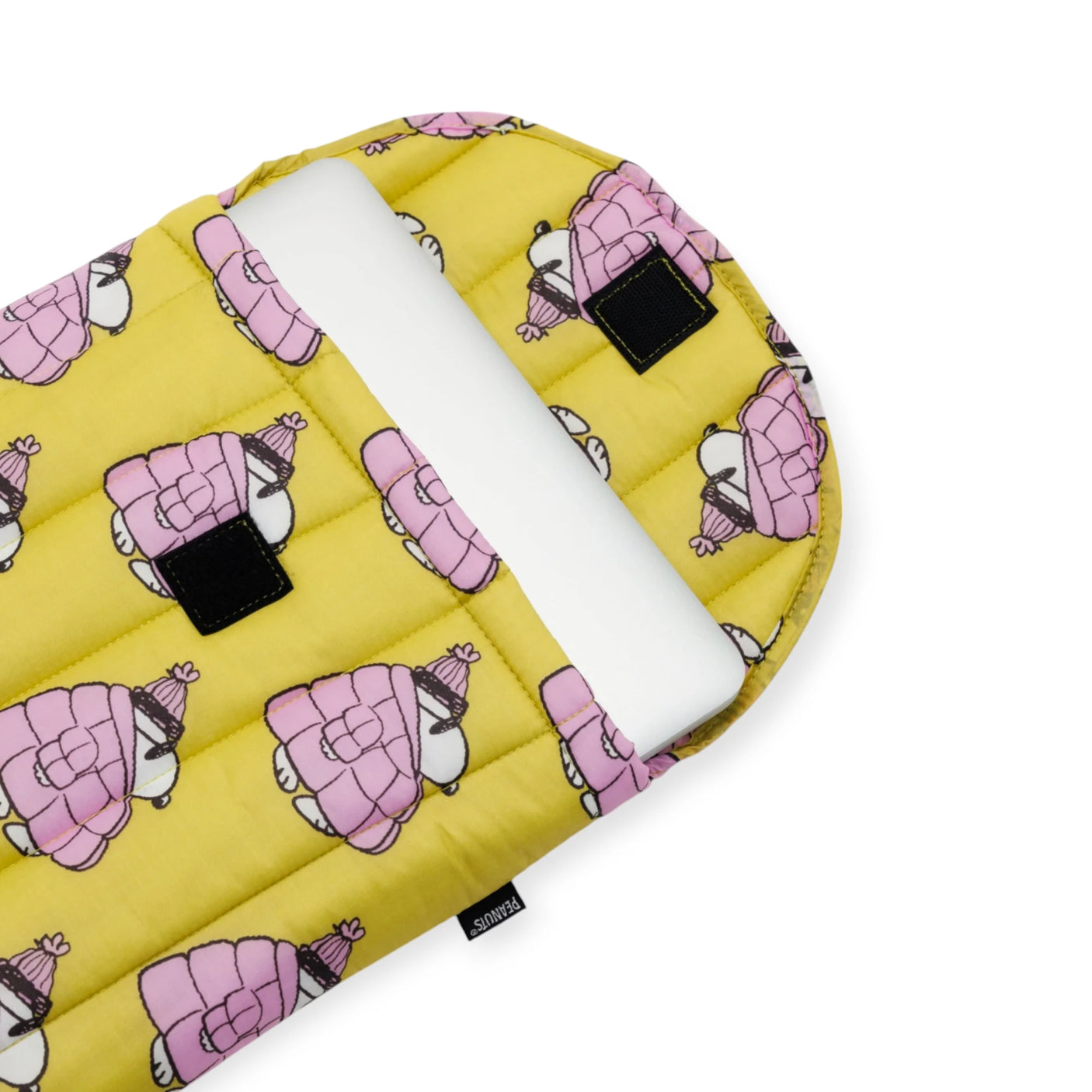 The Peanuts x Baggu Laptop Sleeve - Snoopy Puffer 16" by Baggu is a yellow sleeve with a pink sheep pattern, designed for a 16" device, featuring an open flap and crafted from recycled nylon.