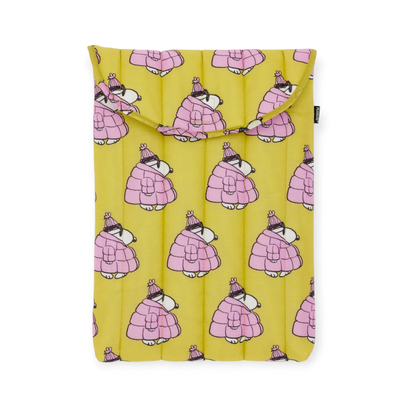 Yellow cushion cover adorned with a whimsical pattern of cartoon characters clad in pink coats and hats. This delightful design complements the eco-friendly allure of recycled nylon, mirroring the playful atmosphere found in the Peanuts x Baggu Laptop Sleeve - Snoopy Puffer 16".