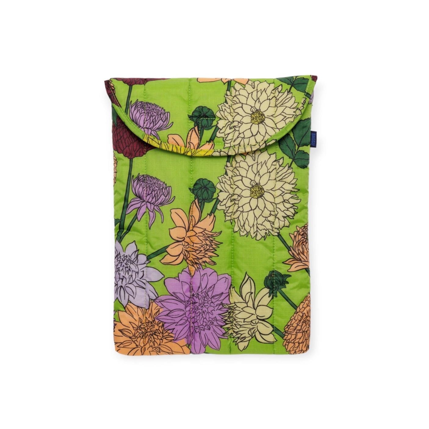 The Baggu Puffy Laptop Sleeve 13"/14" - Dahlia is an eco-friendly pouch from the brand Baggu, showcasing a vibrant dahlia print with purple, yellow, and orange flowers. It comes with a secure flap closure and effortlessly combines style with functionality for your everyday laptop protection needs.