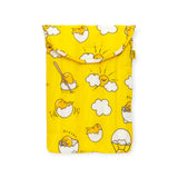 The Gudetama x Baggu Puffy Laptop Sleeve (13"/14") from Baggu showcases a delightful array of Gudetama illustrations, including scenes of the character emerging from an egg and relaxing on clouds. This vibrant yellow pouch makes for a charming laptop sleeve or fun accessory for devotees of the lazy egg.