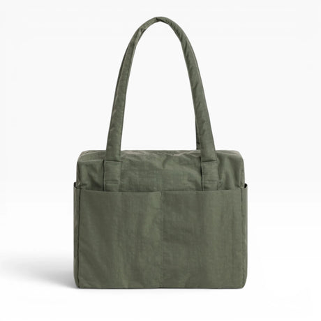 Baggu cloud carry-on tote bag in olive green with top handles and front zip pocket