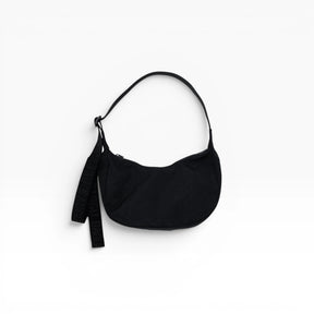 Black small nylon crescent bag with drawstring strap and tassel pull
