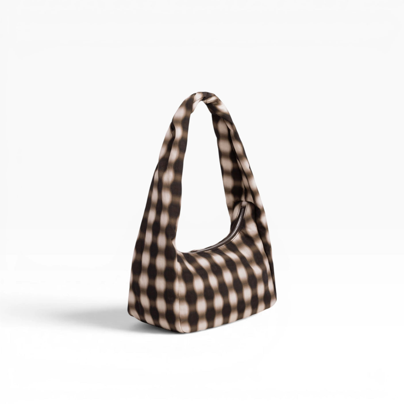 Small nylon shoulder bag with blurred brown gingham, side view