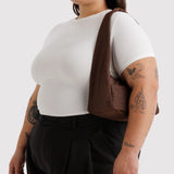 Small coffee-brown nylon hobo bag worn over shoulder