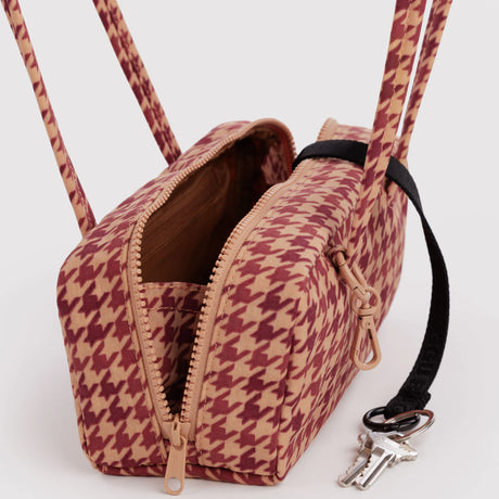 Small houndstooth bowler bag open with zipper, tan and burgundy interior