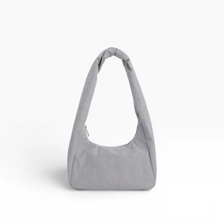 Small fog gray nylon tote bag with side view, short handles and zipper closure