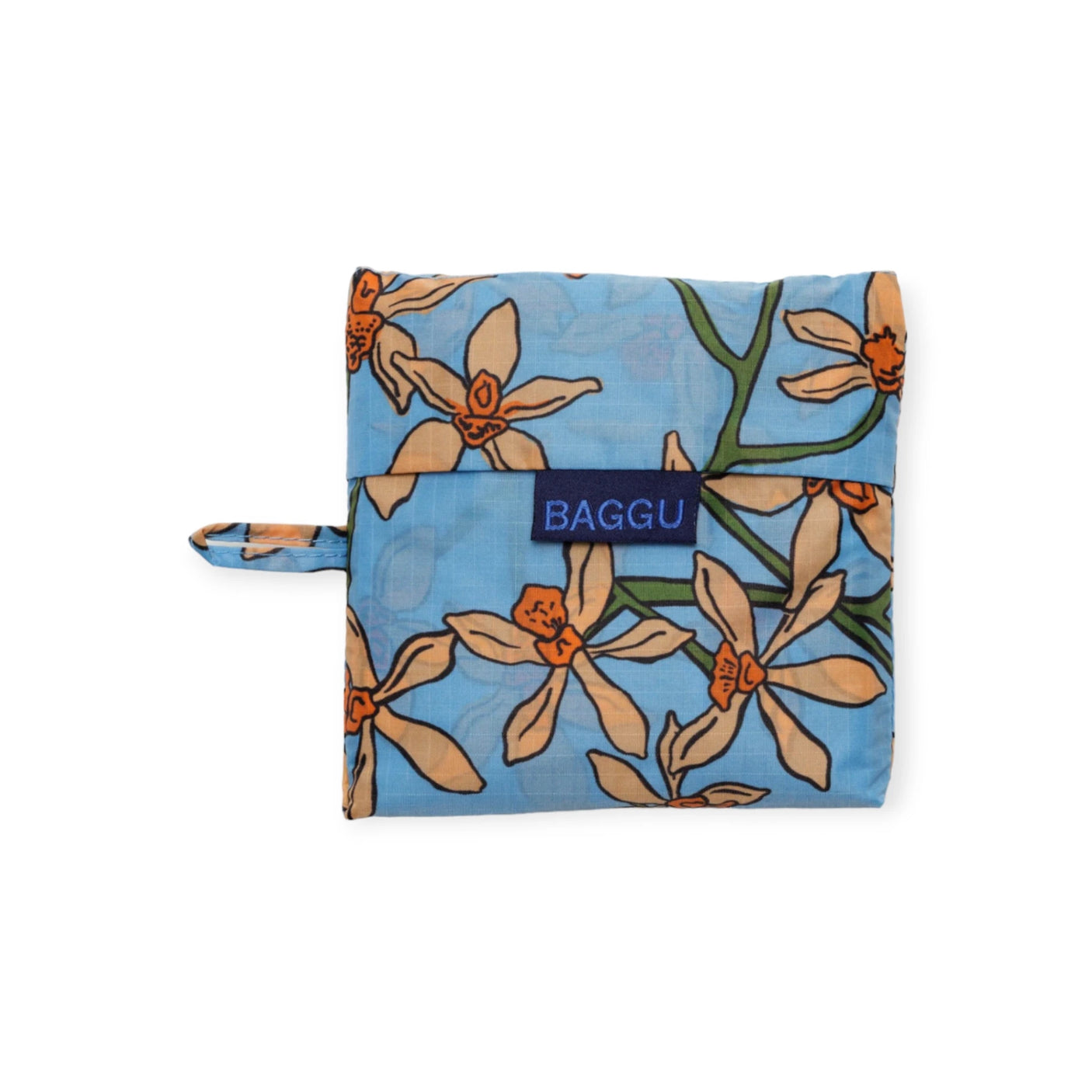 The folded Baggu Standard Reusable Bag - Orchid, by Baggu, features a vibrant orange and white floral pattern set against a blue background. Made from recycled nylon, this fashionable piece is an eco-friendly addition to your daily essentials.