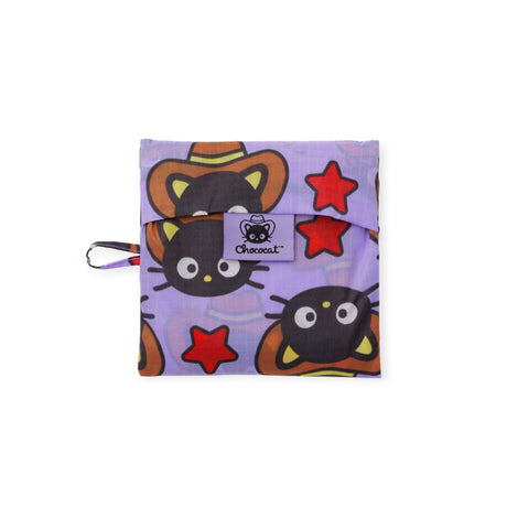 A folded purple Baggu Standard Bag x Chococat Western pouch features cartoon black cats and red stars with a Chococat logo, displayed on a white background.