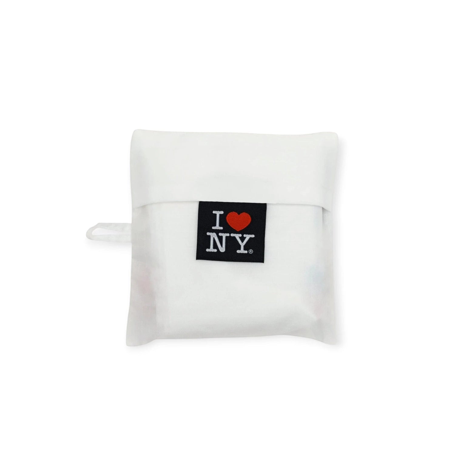 Folded white tote bag with I ♥ NY patch on the front panel