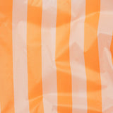 The Baggu Standard Reusable Bag - Tangerine Stripe features orange and white vertical tangerine stripes on the fabric, complemented by subtle wrinkles that add character.