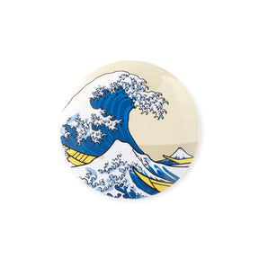 The “Button Badge Art - Hokusai Great Wave” by Today Is Art Day features a round badge with a blue and white wave and boats, inspired by Hokusai's iconic Great Wave and Japanese woodblock prints.