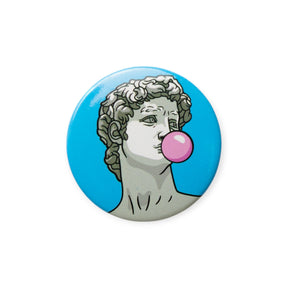 Circular button badge with Michelangelo bust illustration and pink speech bubble