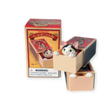 The Kitan Club's Cat in a Matchbox Blind Box features delightful cat figurines housed in matchbox-style packaging. One box is opened to reveal a cat's face, while another stays sealed like a mystery Blind Box. A visible warning label alerts users to the presence of small parts.