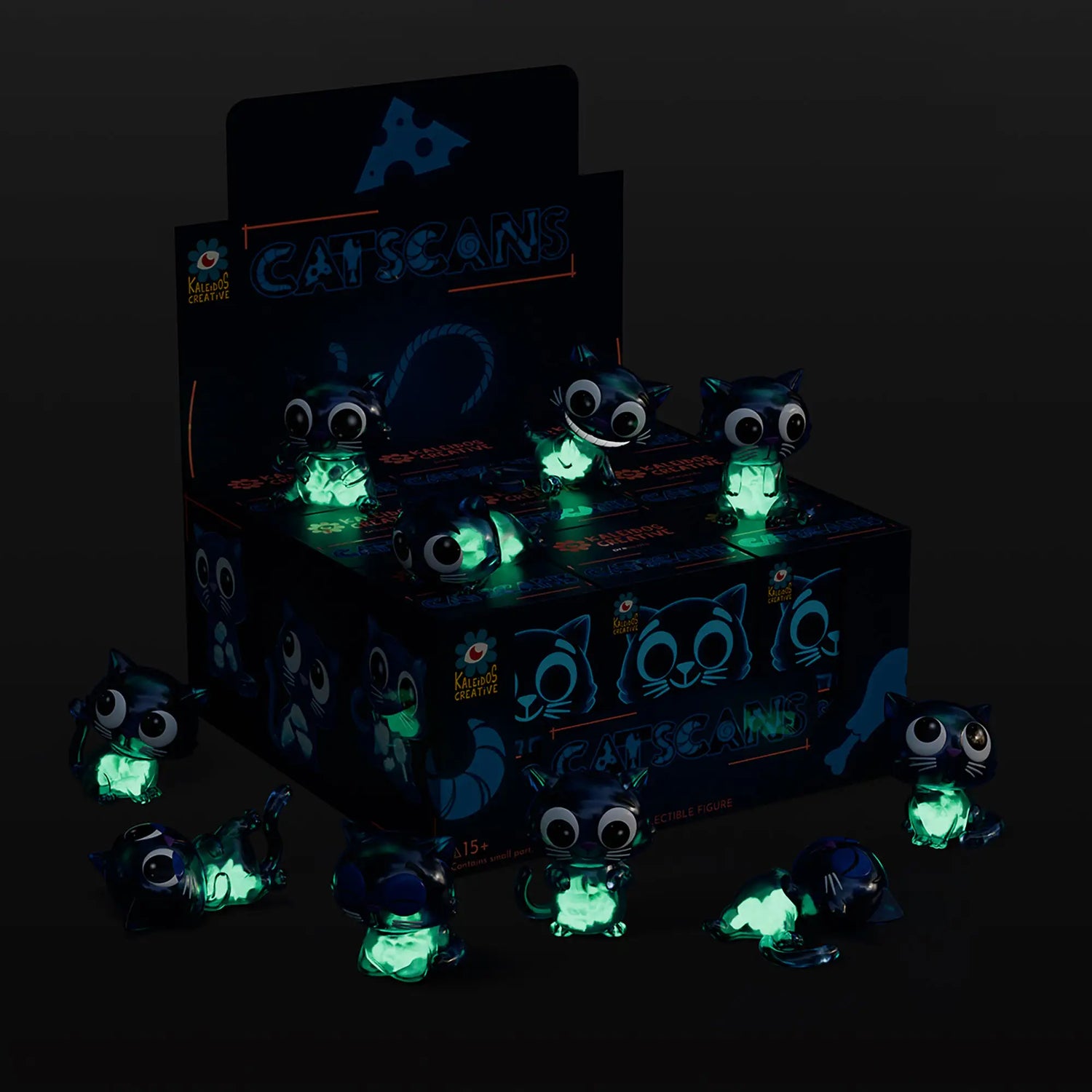 Collectible blind box with glowing cat-scan figures and box packaging