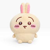 Cute beige plush rabbit with pink cheeks, long ears, and smiling face