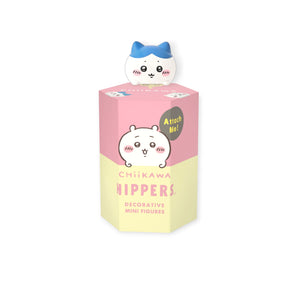 The Sonny Angel Chiikawa Hippers Blind Box features adorable collectible stick-on companions, including a small white character figure with a blue bow on top.