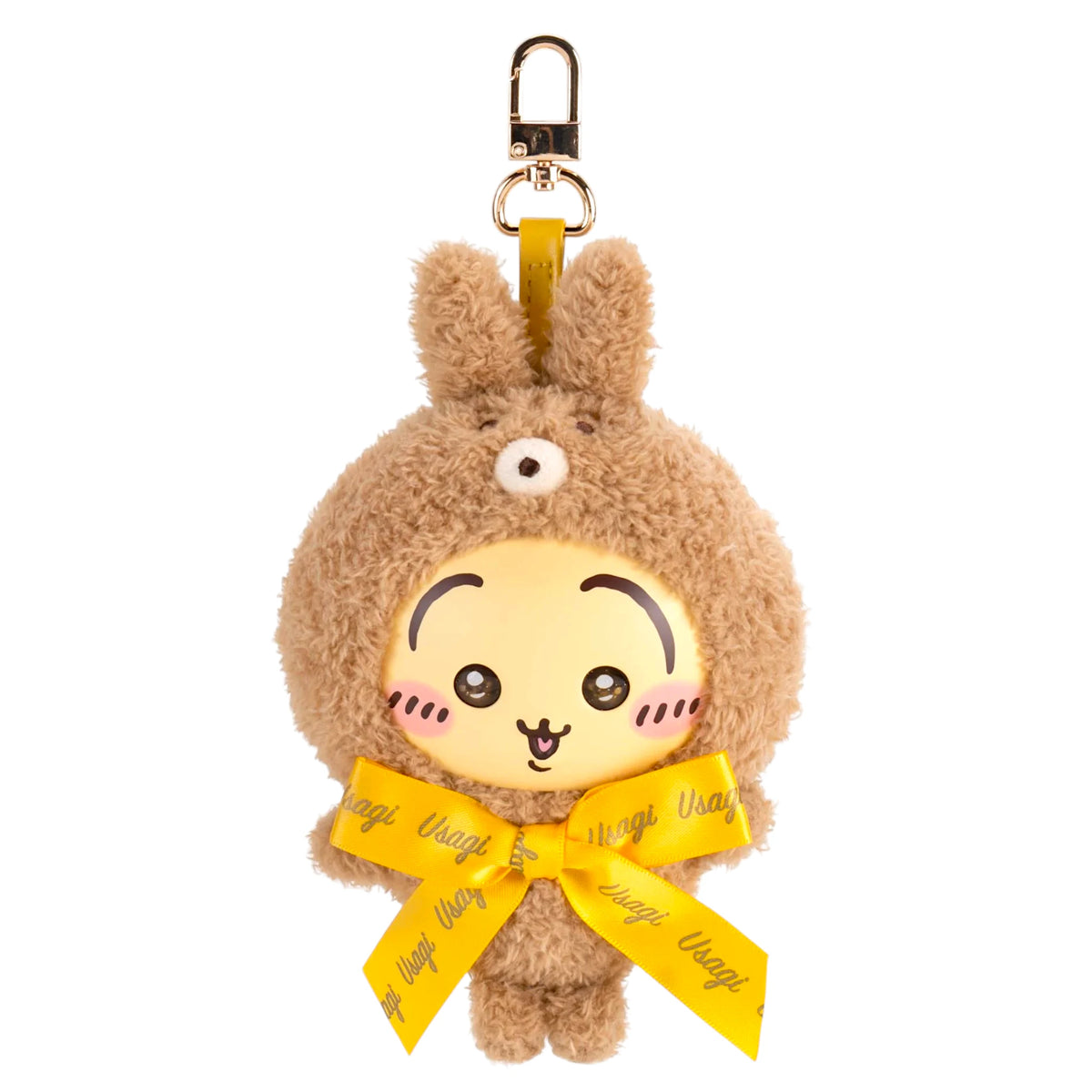 Brown teddy bear plush keychain with yellow ribbon and metal clip, smiling face.